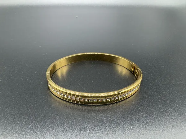 Gold-Toned_Bracelet_With_Crystal_Embellishments