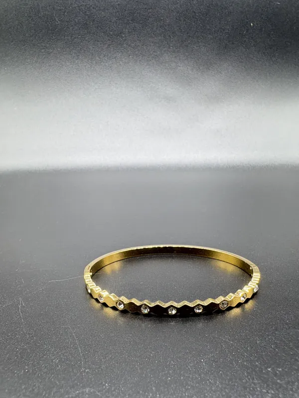 Elegant_Gold_Stackable_Ring_With_Diamond_Accents
