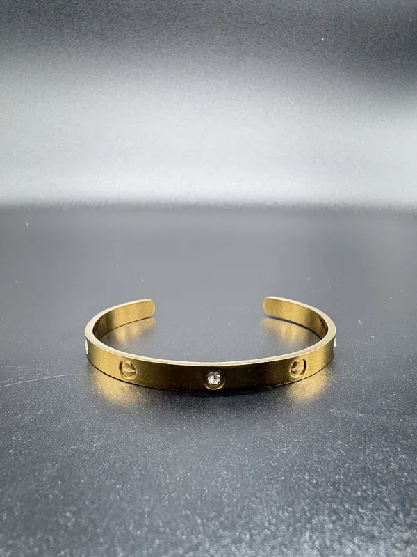 Gold-Toned_Screw_Design_Stainless_Steel_Cuff_Bracelet