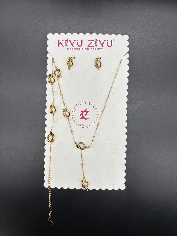Gold-Tone_Knotted_Chain_Jewelry_Set_With_Earrings,_Bracelet,_And_Lariat_Necklace