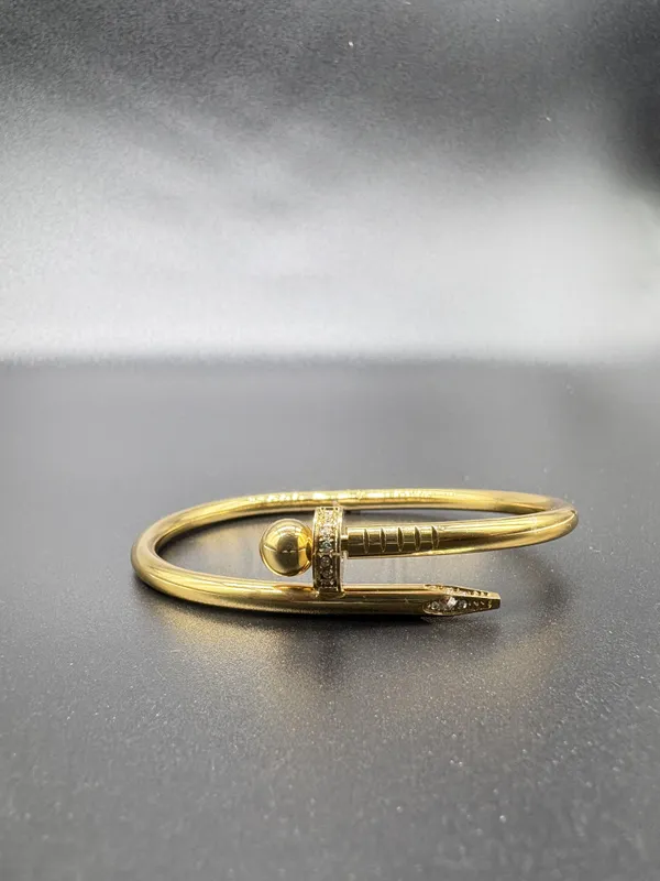 Gold-Plated_Nail_Bracelet_With_Diamond_Accents