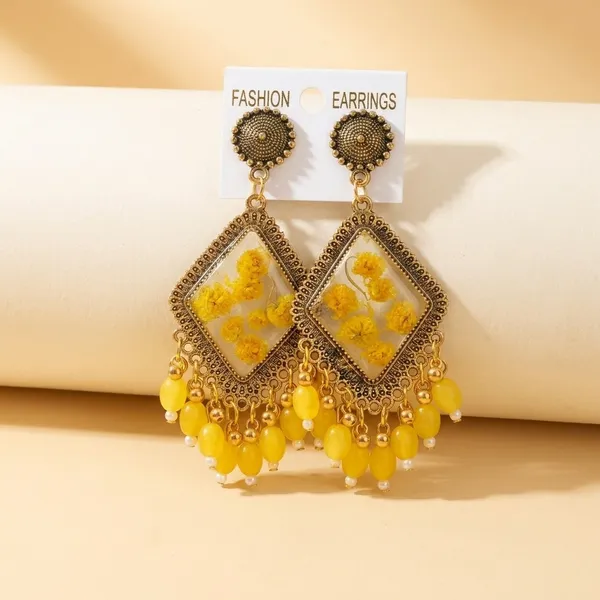 Handcrafted_Real_Pressed_Yellow_Floral_Statement_Resin_Earrings_With_Golden_Detailing_And_Bead_Danglers