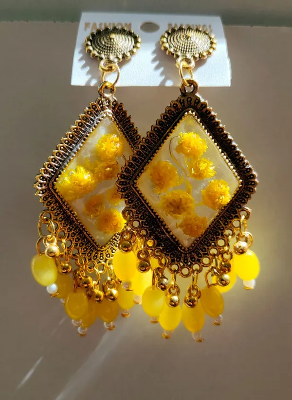 Handcrafted_Real_Pressed_Yellow_Floral_Statement_Resin_Earrings_With_Golden_Detailing_And_Bead_Danglers