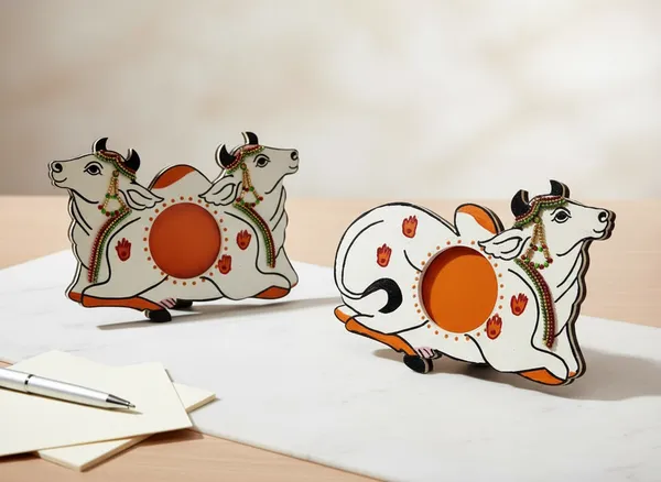 Pair_of_2_Handcrafted_White_And_Orange_Decorative_Pitchwai_Cow_Tea_Light_Holder