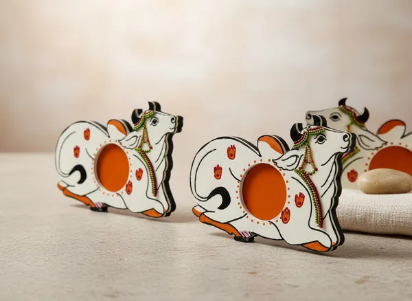 Pair_of_2_Handcrafted_White_And_Orange_Decorative_Pitchwai_Cow_Tea_Light_Holder