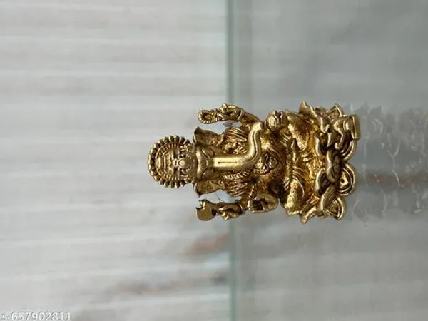 Brass_Lord_Ganesha_Idol_Seated_On_A_Lotus_Base_Antique_Brass_Ganesh_For_Puja_And_Home_Purposes_30_grm