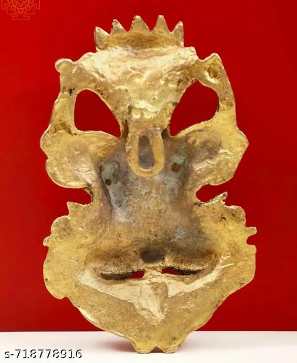 Metal_Gold_Nazar_Battu_With_Naag_Ganesha_For_Evil_Eye_Protection_And_Nazar_Suraksha_Bad_Eye_Suraksha_Kavach_Mask_For_Home_Office_Wall_Door_Hanging_Decor_Accessories_Feng_Shui_Vastu_Showpiece_Wall_Hanging_Is_A_Representation_Of_A_Kirtimukha_With_A_Seated_Ganesha_Figure_On_Top
