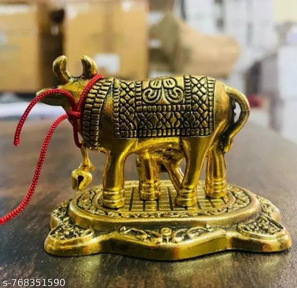 Golden_Plated_Brass_Showpiece_Statue_Depicting_The_Kamadhenu_Cow_And_Calf_Often_Used_For_Home_Decor_And_Spiritual_Purposes