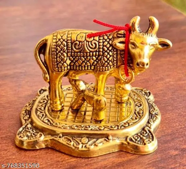 Golden_Plated_Brass_Showpiece_Statue_Depicting_The_Kamadhenu_Cow_And_Calf_Often_Used_For_Home_Decor_And_Spiritual_Purposes