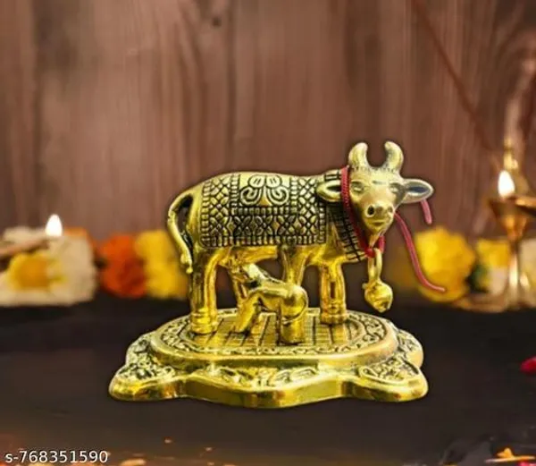 Golden_Plated_Brass_Showpiece_Statue_Depicting_The_Kamadhenu_Cow_And_Calf_Often_Used_For_Home_Decor_And_Spiritual_Purposes