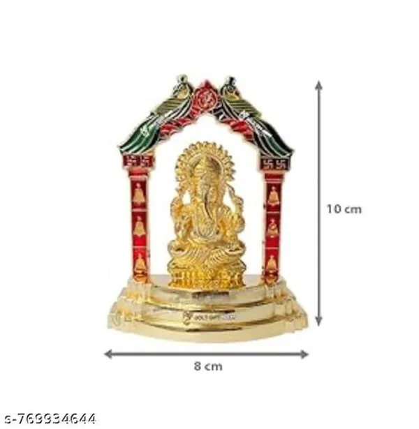 Lord_Ganesha_seated_under_a_decorative_archway