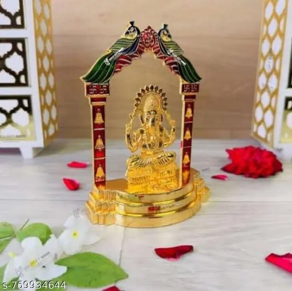 Lord_Ganesha_seated_under_a_decorative_archway