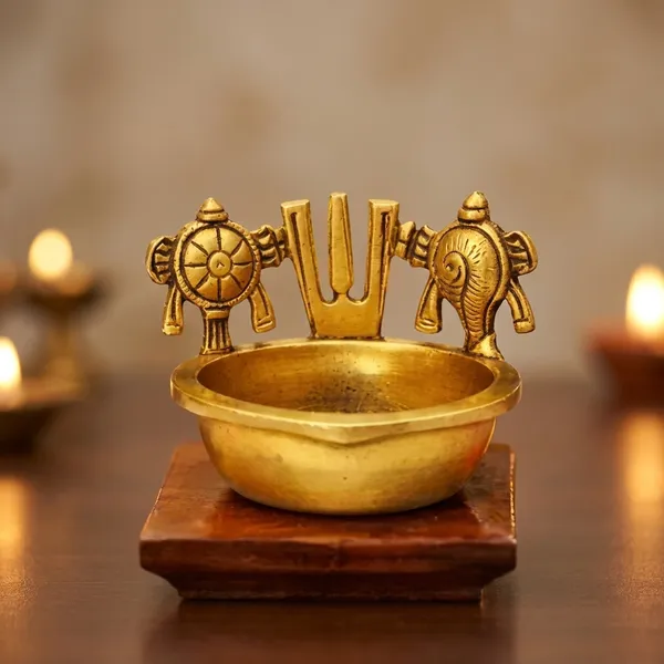 Handcrafted_Brass_Shankh_Chakra_Namah_Diya_A_Traditional_Indian_Oil_Lamp_Often_Used_For_Worship_And_Home_Decor