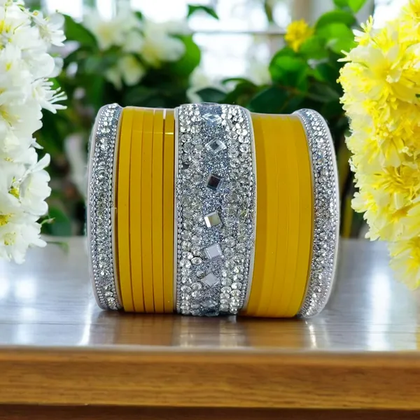 Silk_Star_Premium_Bright_Yellow_And_Silver_Sparkling_Plastic_Bangle_Set_For_Women