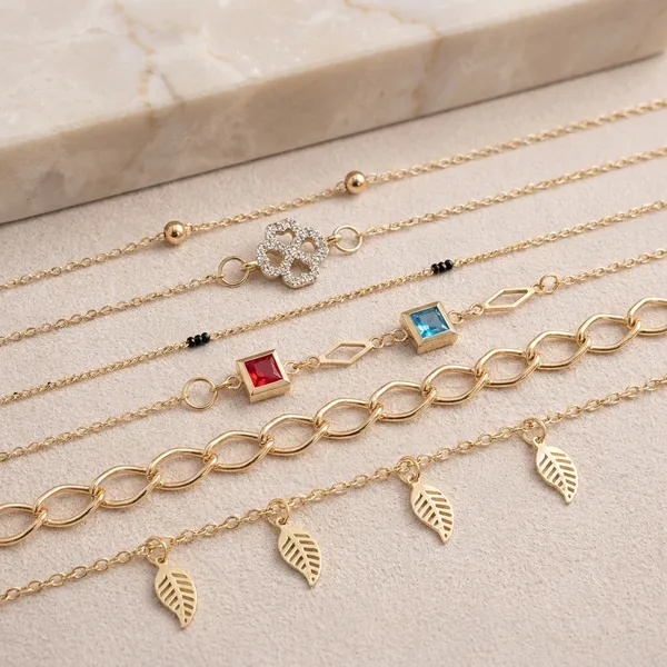 Elegant_Gold_Tone_Bracelet_Set_Stylish_And_Versatile