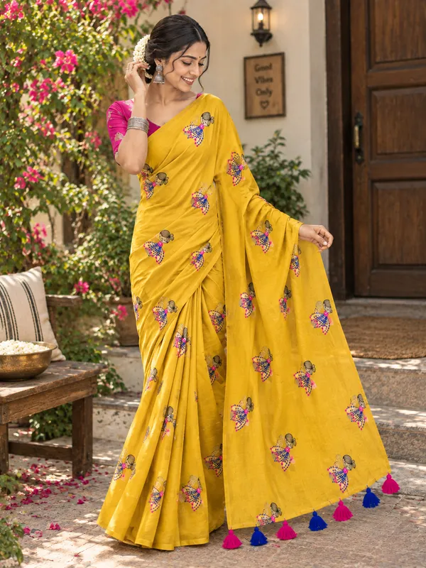 Mustard_Yellow_Mul_Cotton_Saree_With_Doll_Motif_And_Tassels
