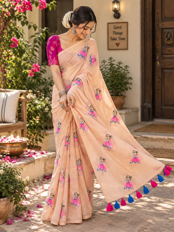 Peach_Mul_Cotton_Saree_With_Doll_Motif_And_Tassels