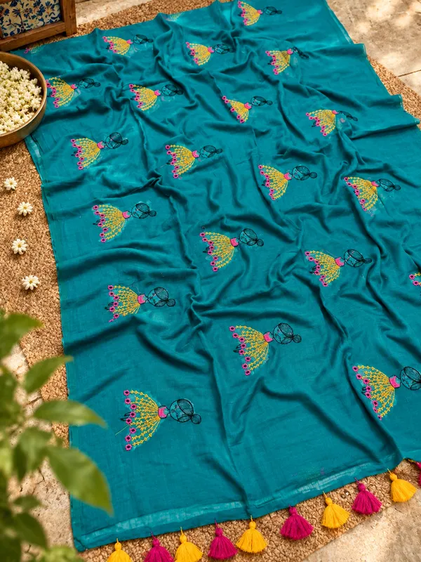 Teal_Mul_Cotton_Saree_With_Doll_Motif_And_Tassels