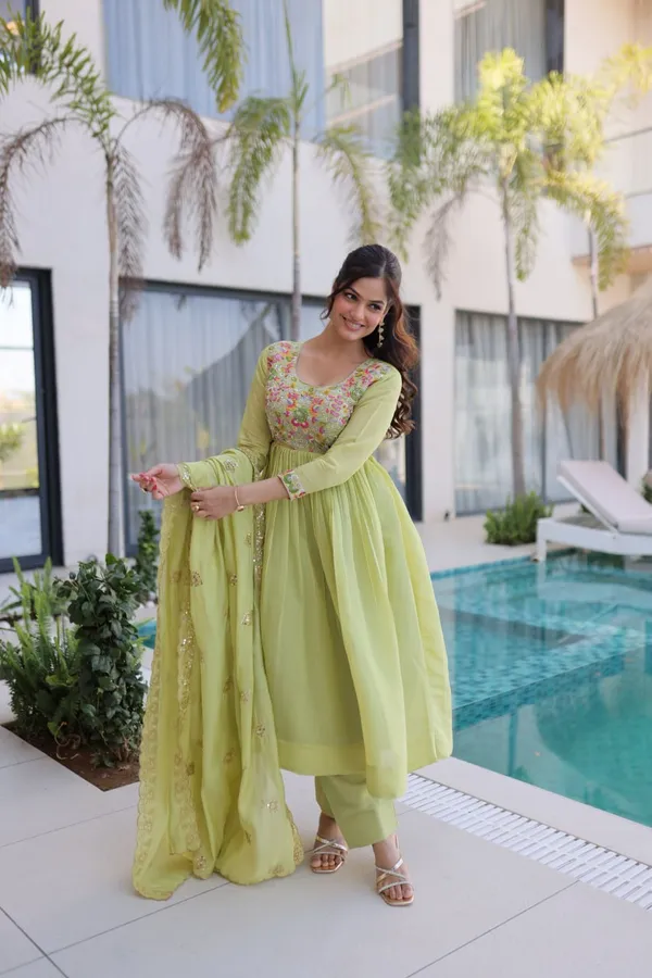 Luxury_Pista_Green_Mal_Chanderi_Embroidered_Gown_Pant_Dupatta_Set_For_Women