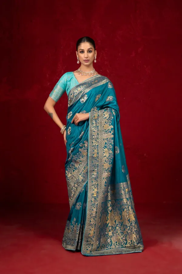 Turquoise_Blue_Kalamkari_Figure_Weaving_Dola_Silk_Saree_With_Rich_Pallu_And_Unstitched_Blouse