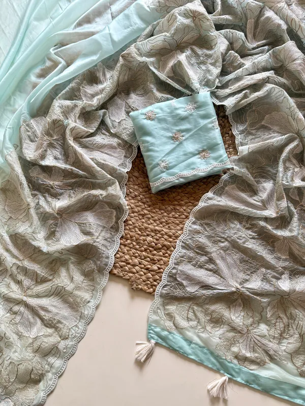 Pastel_Mint_Floral_Embroidered_Crystal_Tissue_Saree_With_Cutwork_Tassel_Pallu_And_Unstitched_Blouse