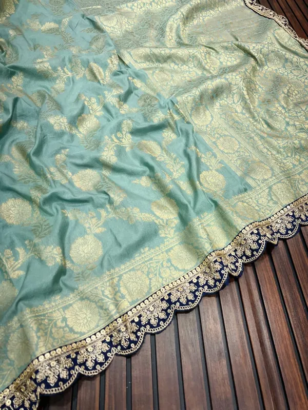 Ice_Blue_Floral_Jacquard_Khadi_Crepe_Georgette_Saree_With_Sequins_Cutwork_Lace_Unstitched_Blouse