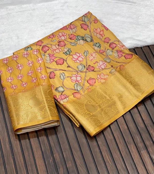 Mustard_Yellow_Floral_Kalamkari_Malabari_Silk_Saree_With_Jacquard_Border_And_Unstitched_Blouse