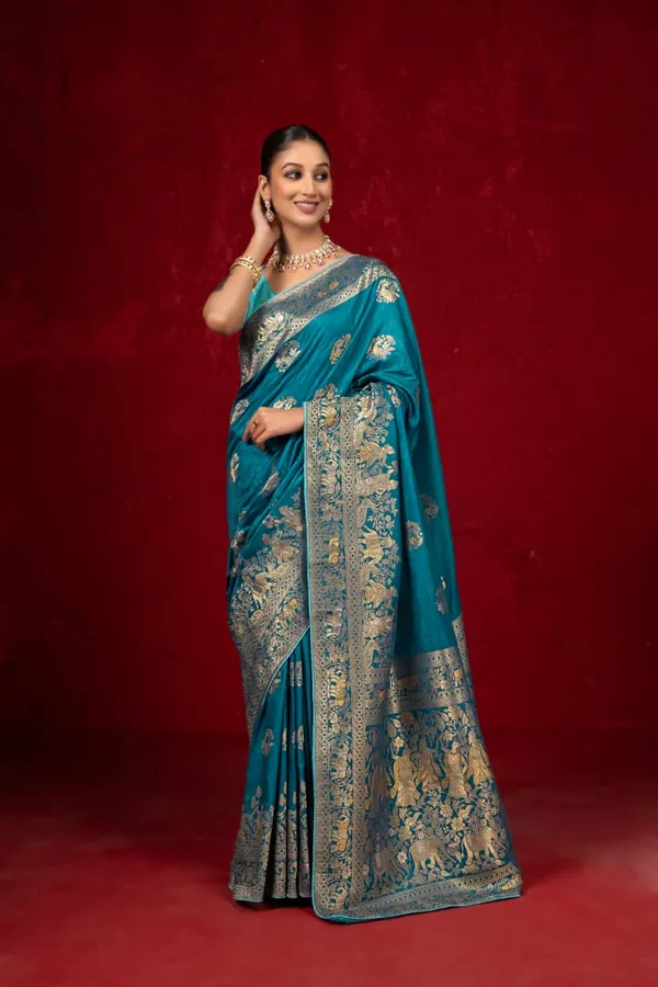 Turquoise_Blue_Kalamkari_Figure_Weaving_Dola_Silk_Saree_With_Rich_Pallu_And_Unstitched_Blouse