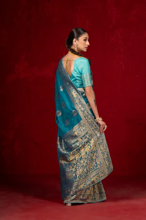 Turquoise_Blue_Kalamkari_Figure_Weaving_Dola_Silk_Saree_With_Rich_Pallu_And_Unstitched_Blouse