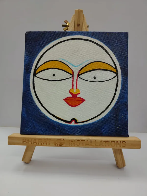 Handpainted_Face_Canvas_With_Easel_Stand_Blue_Background