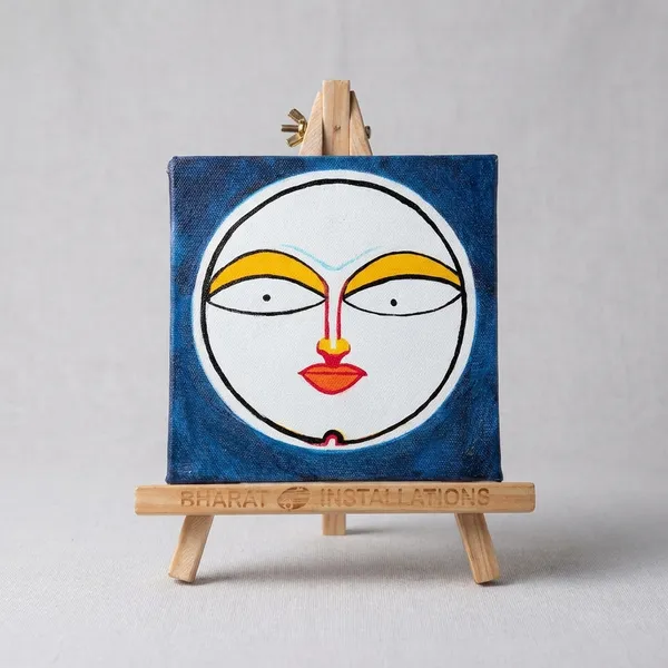 Handpainted_Face_Canvas_With_Easel_Stand_Blue_Background