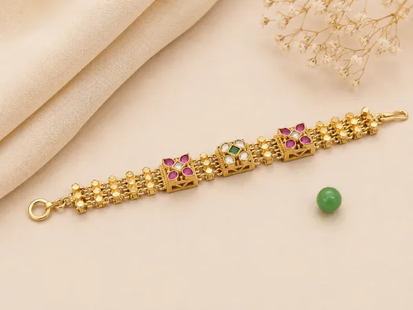 Antique_Gold_Wide-Band_Bracelet_With_Ruby_And_Emerald_Stones