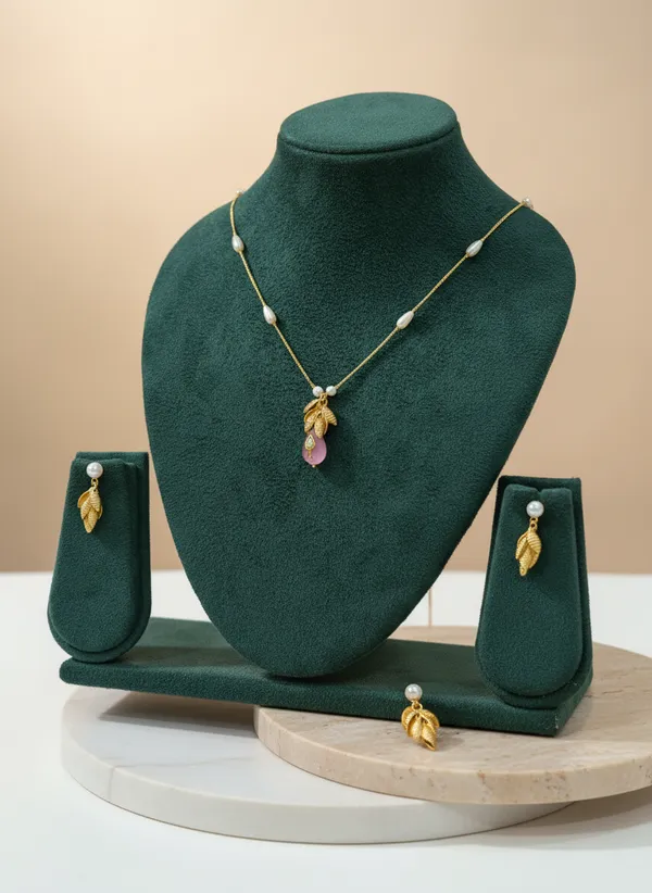 Gold_Leaf_Necklace_Set_With_Pink_Stone_And_Pearl_Chain