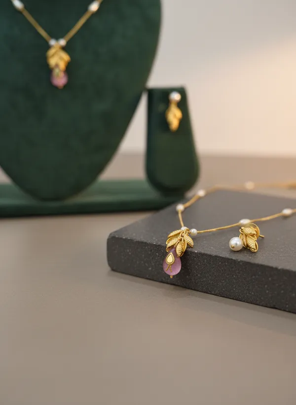 Gold_Leaf_Necklace_Set_With_Pink_Stone_And_Pearl_Chain