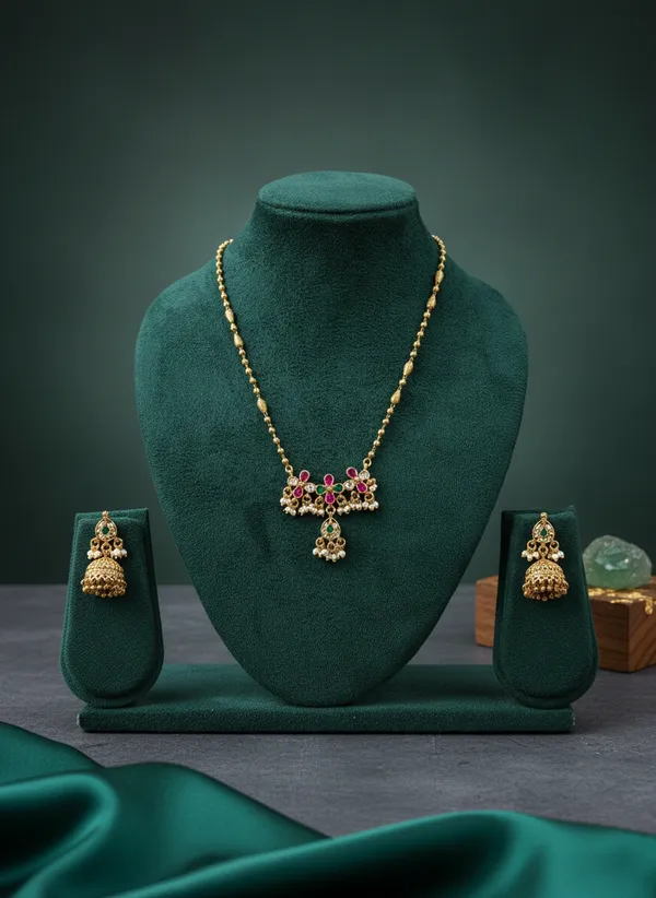 Antique_Gold_Floral_Necklace_Set_With_Jhumka_Earrings