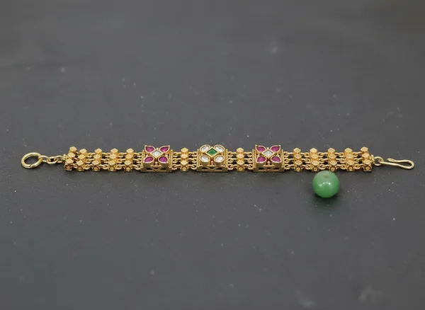Antique_Gold_Wide-Band_Bracelet_With_Ruby_And_Emerald_Stones