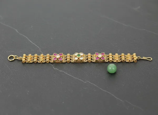 Antique_Gold_Wide-Band_Bracelet_With_Ruby_And_Emerald_Stones