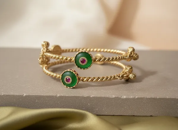 Gold_Twisted_Rope_Bangles_With_Jade_Green_Round_Motif_And_Ghungroo_Drops
