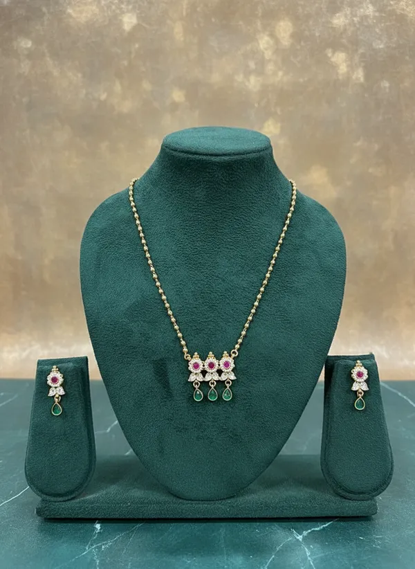 Antique_Gold_Triple_Floral_Necklace_Set_With_Emerald_Drops