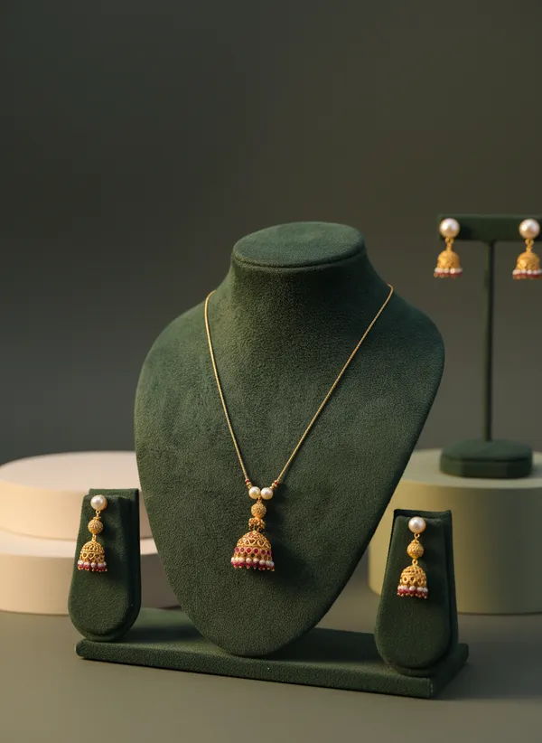 Gold_Filigree_Jhumka_Pendant_Necklace_Set_With_Pearl_And_Ruby_Drops