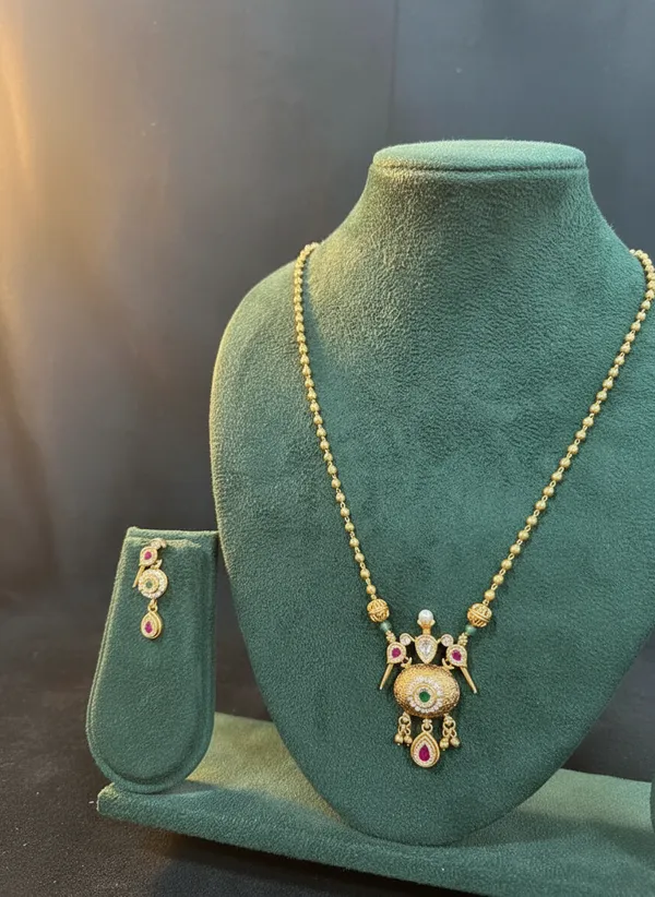 Antique_Gold_Peacock_Necklace_Set_With_Ruby_And_Emerald_Drops