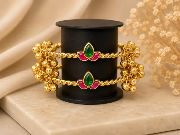 Antique_Gold_Twisted_Rope_Bangles_With_Ruby_And_Emerald_Motif_And_Ghungroo_Drops