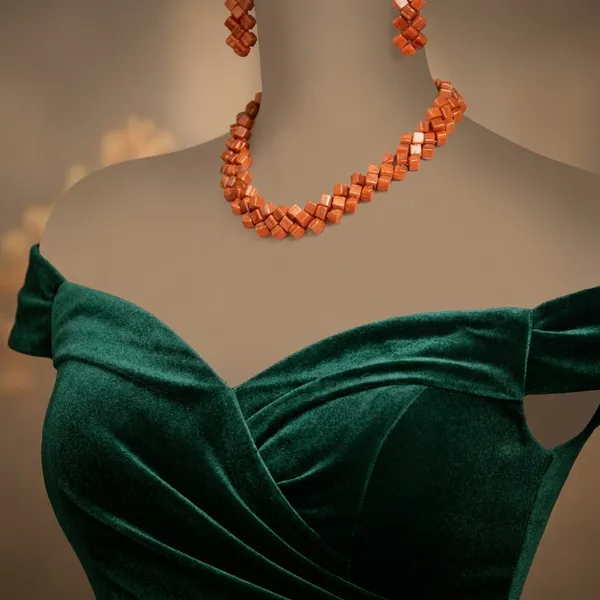 Elegant_Off-Shoulder_Velvet_Evening_Gown_With_Statement_Jewelry_Set