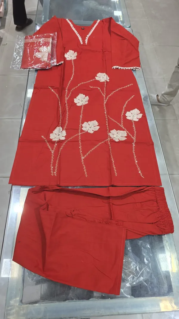 Orange_Embroidered_Salwar_Suit_Set_With_Floral_Embellishments