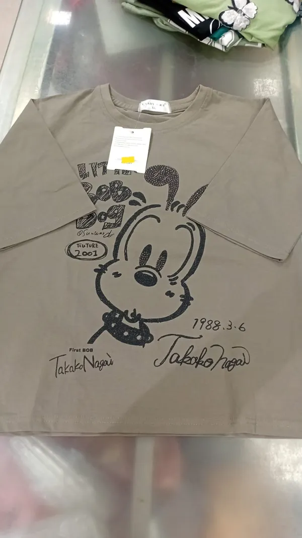 Beige_Graphic_Print_T-Shirt_With_Cartoon_Design