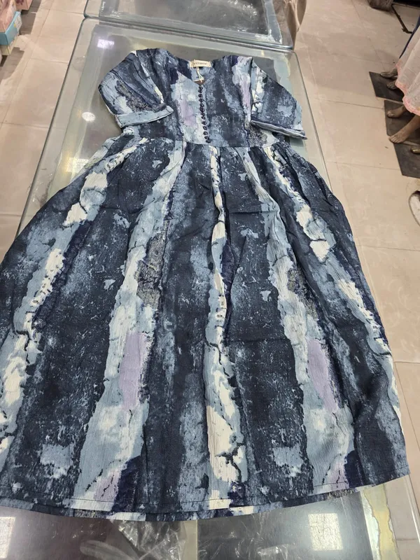 Vintage-Style_Distressed_Dress_With_Textured_Print_Design