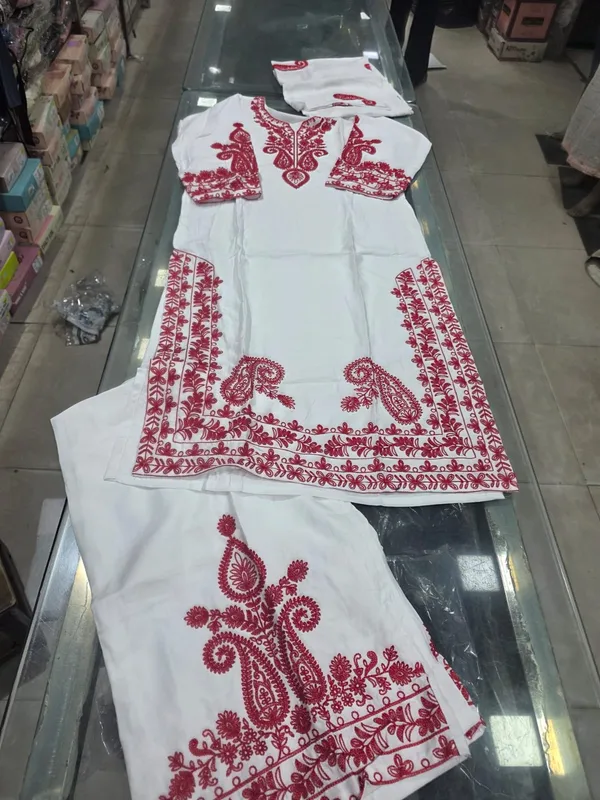 Embroidered_White_Salwar_Kameez_Set_With_Red_Thread_Work