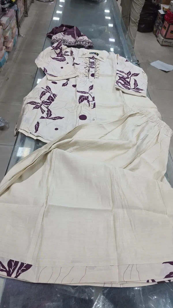 White_Embroidered_Salwar_Suit_Set_With_Purple_Floral_Design_And_Flare_Bottom