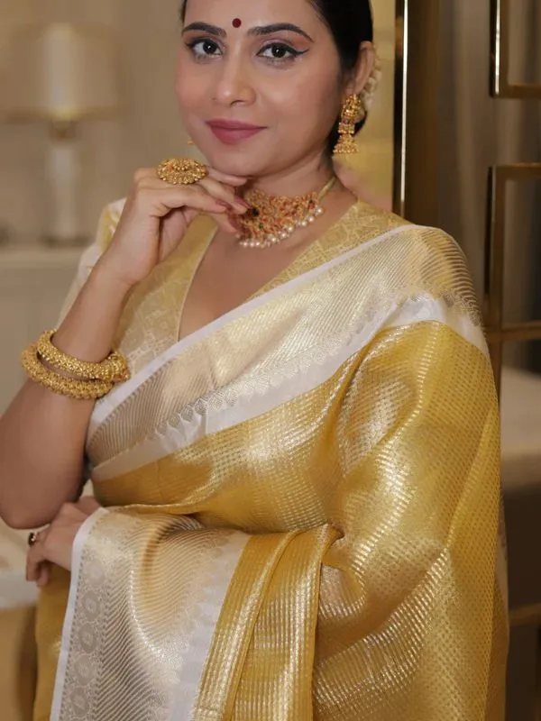 Traditional_Kanchipuram_Silk_Saree_In_With_Silver_Zari_Border_Golden_Yellow