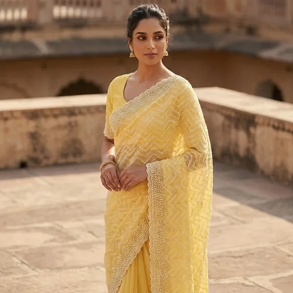 Embroidered_Net_Saree_With_Pearl_Border_And_Blouse_Yellow